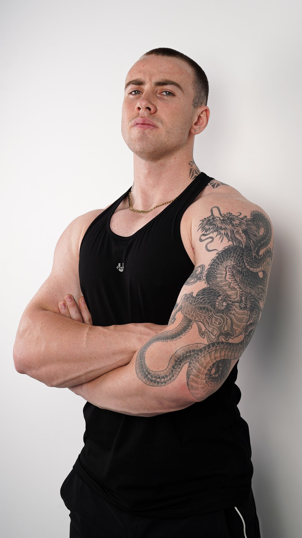 SIGNATURE RACER-BACK TANK