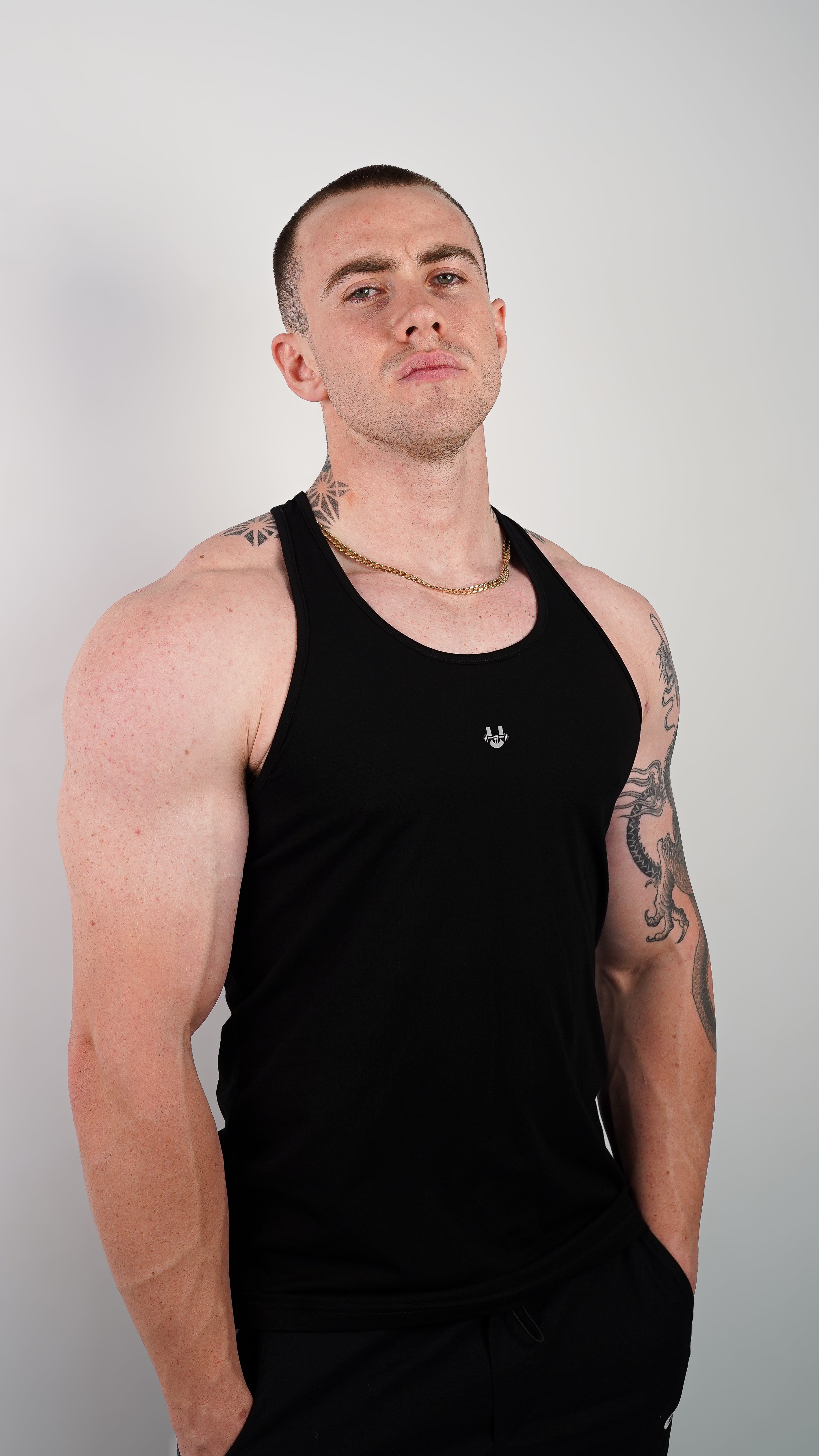 SIGNATURE RACER-BACK TANK