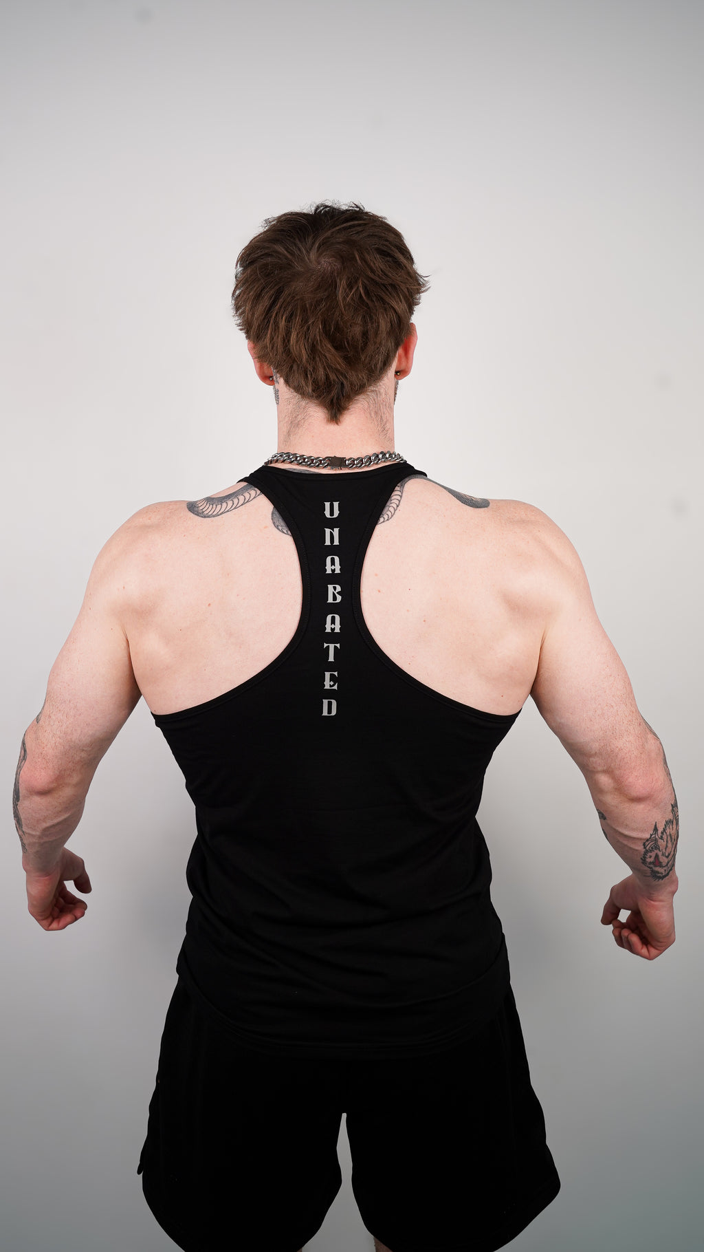 SIGNATURE RACER-BACK TANK
